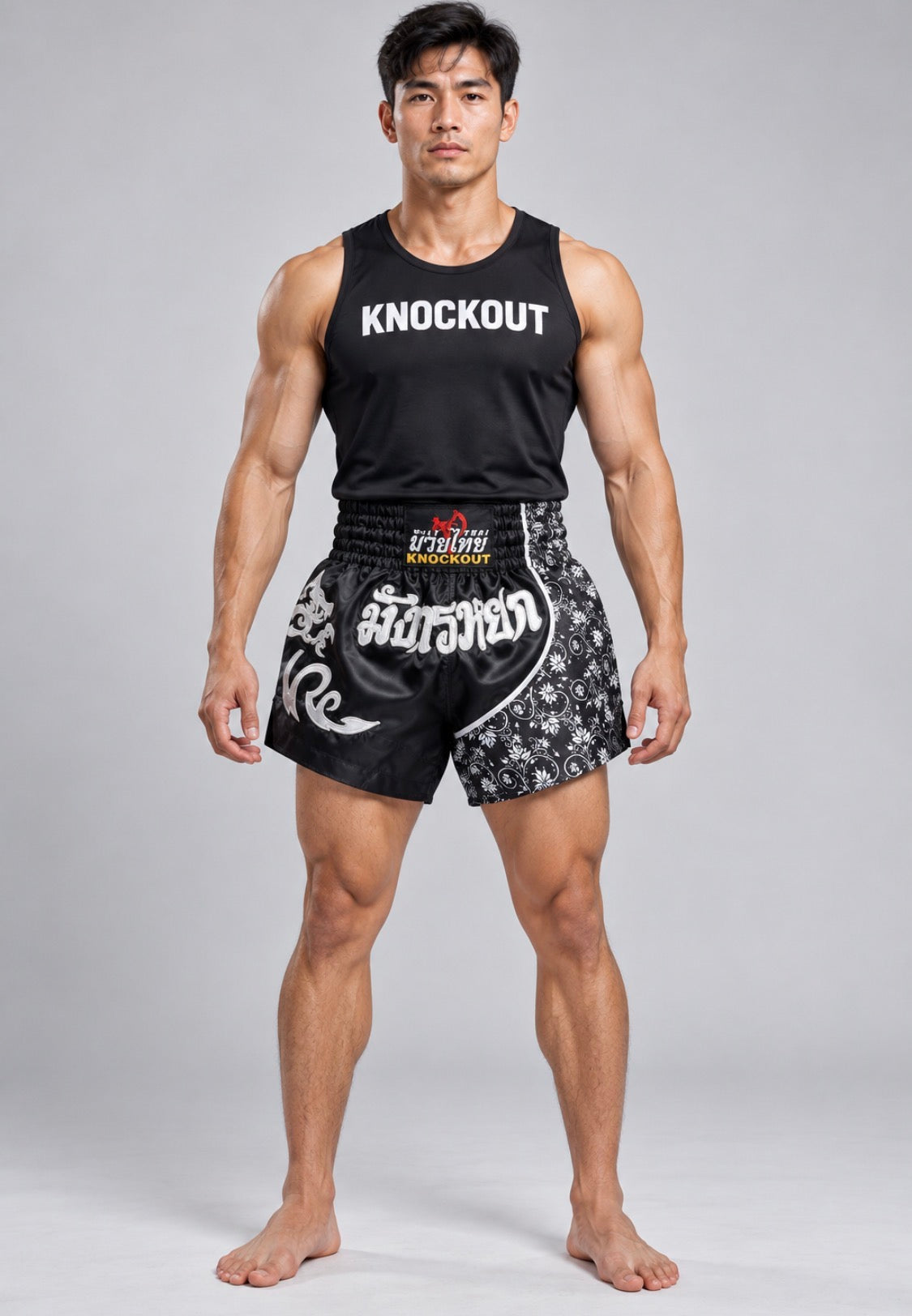 Knockout Muay Thai Black patterned shorts on model